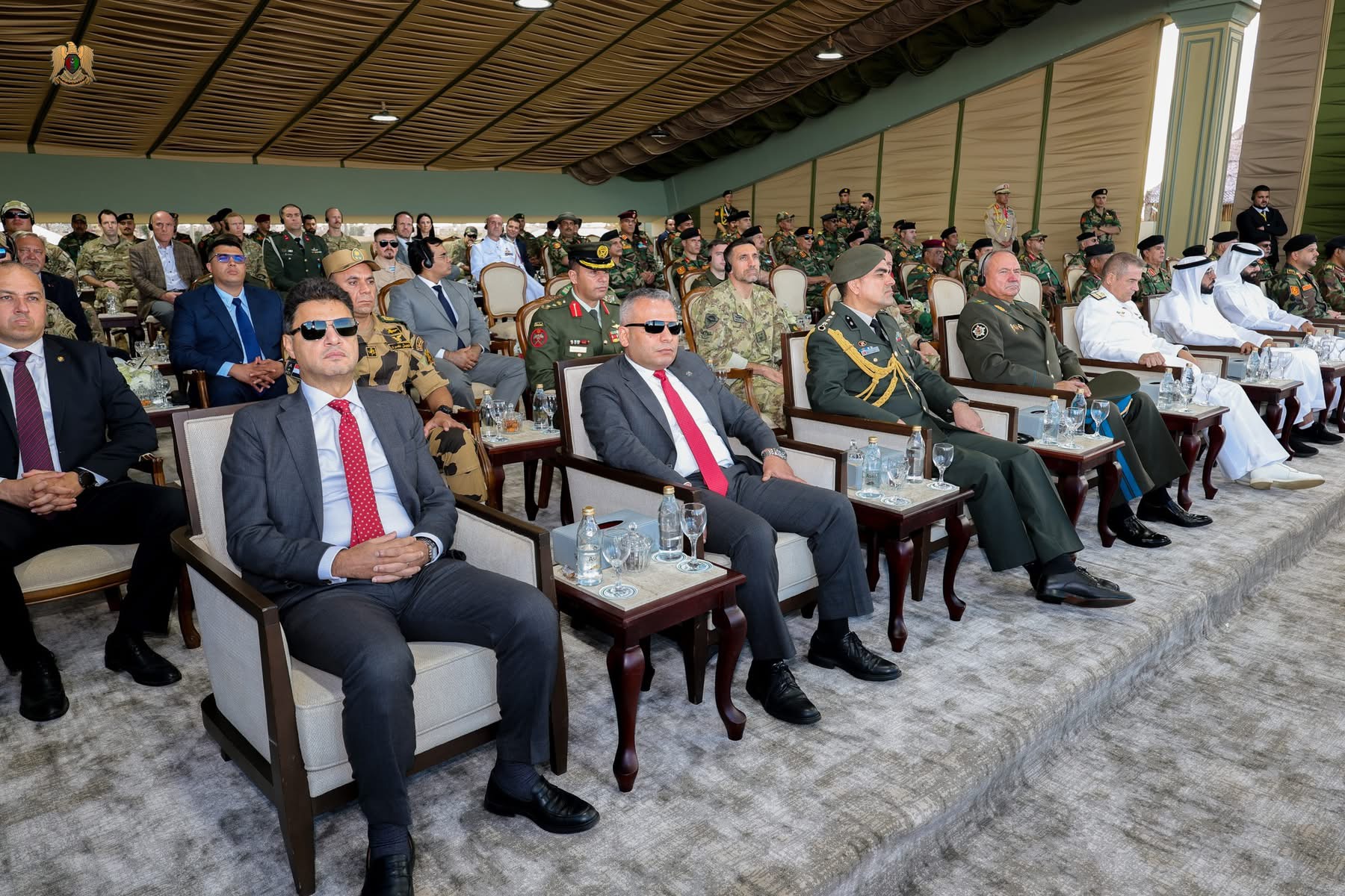 القائد العام للقوات المسلحة المشير اركان حرب خليفة حفتر ونائبه الفريق أول ركن صدام حفتر يشهدان عرضًا عسكريًا للقوات الخاصة ببنغازي إحياءً للذكرى الثانية عشرة لدخول القوات المسلحة المدينة